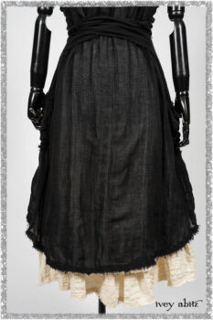 Trelawny Vest in Beacon Black Hemstitch Stripe Gauze; Clotaire Sash in Ethereal Cream and Black Fleur Stretch Cotton; Ardsleydale Frock in Ethereal Cream Embroidered Crushed Plaid. Ivey Abitz bespoke clothing.