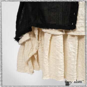 Trelawny Vest in Beacon Black Hemstitch Stripe Gauze; Clotaire Sash in Ethereal Cream and Black Fleur Stretch Cotton; Ardsleydale Frock in Ethereal Cream Embroidered Crushed Plaid. Ivey Abitz bespoke clothing.
