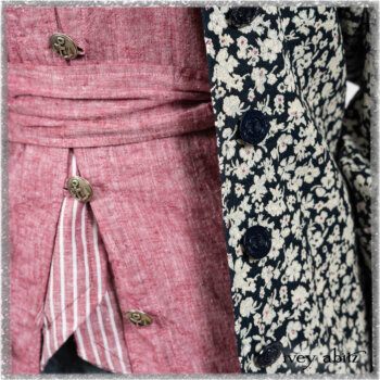 Pierrepont Shirt in Red Sky at Night Yarn Dyed Weave; Viv Coat Dress in National Seashore Floral Jacquard; Clotaire Sash in Red Sky at Night Stripe; Viv Trousers in Estuary Herringbone Twill. Ivey Abitz bespoke clothing.