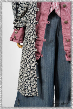 Pierrepont Shirt in Red Sky at Night Yarn Dyed Weave; Viv Coat Dress in National Seashore Floral Jacquard; Clotaire Sash in Red Sky at Night Stripe; Viv Trousers in Estuary Herringbone Twill. Ivey Abitz bespoke clothing.