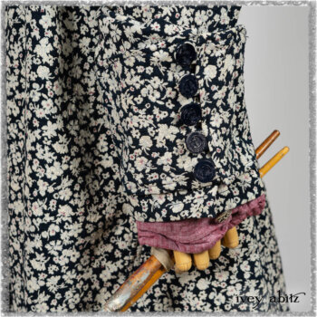 Pierrepont Shirt in Red Sky at Night Yarn Dyed Weave; Viv Coat Dress in National Seashore Floral Jacquard; Clotaire Sash in Red Sky at Night Stripe; Viv Trousers in Estuary Herringbone Twill. Ivey Abitz bespoke clothing.