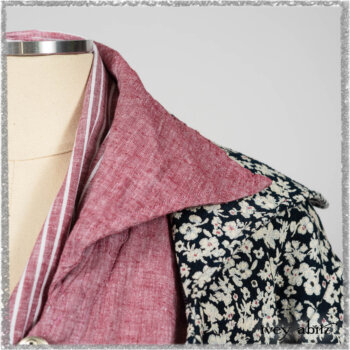 Pierrepont Shirt in Red Sky at Night Yarn Dyed Weave; Viv Coat Dress in National Seashore Floral Jacquard; Clotaire Sash in Red Sky at Night Stripe; Viv Trousers in Estuary Herringbone Twill. Ivey Abitz bespoke clothing.