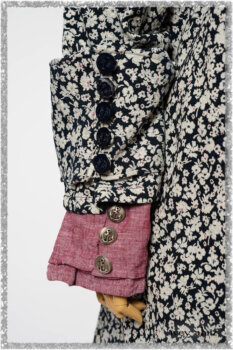Pierrepont Shirt in Red Sky at Night Yarn Dyed Weave; Viv Coat Dress in National Seashore Floral Jacquard; Clotaire Sash in Red Sky at Night Stripe; Viv Trousers in Estuary Herringbone Twill. Ivey Abitz bespoke clothing.