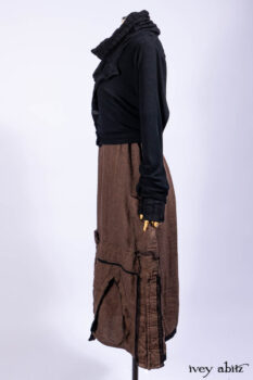 Hudson Jacket in Signature Black Ribbed Knit; Roebling Frock in Brownstone Washed Linen; Lydia Neck Wrap and Lydia Arm Wraps in Signature Black Washed Knit; Cilla Slip Frock in Signature Black Ribbed Knit.