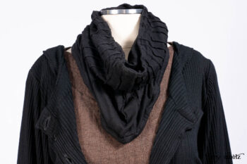 Hudson Jacket in Signature Black Ribbed Knit; Roebling Frock in Brownstone Washed Linen; Lydia Neck Wrap and Lydia Arm Wraps in Signature Black Washed Knit; Cilla Slip Frock in Signature Black Ribbed Knit.