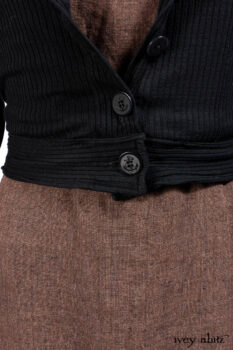 Hudson Jacket in Signature Black Ribbed Knit; Roebling Frock in Brownstone Washed Linen; Lydia Neck Wrap and Lydia Arm Wraps in Signature Black Washed Knit; Cilla Slip Frock in Signature Black Ribbed Knit.
