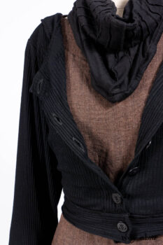 Hudson Jacket in Signature Black Ribbed Knit; Roebling Frock in Brownstone Washed Linen; Lydia Neck Wrap and Lydia Arm Wraps in Signature Black Washed Knit; Cilla Slip Frock in Signature Black Ribbed Knit.