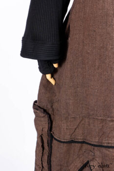 Hudson Jacket in Signature Black Ribbed Knit; Roebling Frock in Brownstone Washed Linen; Lydia Neck Wrap and Lydia Arm Wraps in Signature Black Washed Knit; Cilla Slip Frock in Signature Black Ribbed Knit.