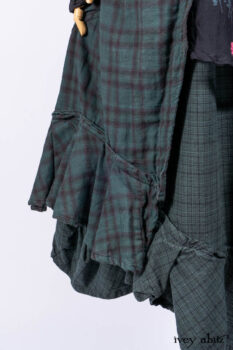Inglenook Duster Coat in Riverside Black Watch Double Layered Weave; Nook Frock in Riverside Floral Silk Chiffon; Inglenook Frock in Riverside Plaid Cotton; Lydia Neck Wrap and Lydia Arm Wraps in Signature Black Washed Knit.