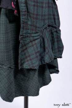 Inglenook Duster Coat in Riverside Black Watch Double Layered Weave; Nook Frock in Riverside Floral Silk Chiffon; Inglenook Frock in Riverside Plaid Cotton; Lydia Neck Wrap and Lydia Arm Wraps in Signature Black Washed Knit.