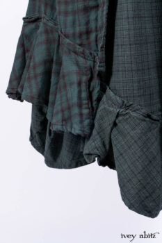 Inglenook Duster Coat in Riverside Black Watch Double Layered Weave; Nook Frock in Riverside Floral Silk Chiffon; Inglenook Frock in Riverside Plaid Cotton; Lydia Neck Wrap and Lydia Arm Wraps in Signature Black Washed Knit.