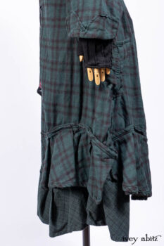 Inglenook Duster Coat in Riverside Black Watch Double Layered Weave; Nook Frock in Riverside Floral Silk Chiffon; Inglenook Frock in Riverside Plaid Cotton; Lydia Neck Wrap and Lydia Arm Wraps in Signature Black Washed Knit.