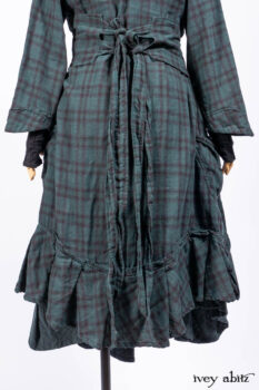 Inglenook Duster Coat in Riverside Black Watch Double Layered Weave; Nook Frock in Riverside Floral Silk Chiffon; Inglenook Frock in Riverside Plaid Cotton; Lydia Neck Wrap and Lydia Arm Wraps in Signature Black Washed Knit.