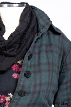 Inglenook Duster Coat in Riverside Black Watch Double Layered Weave; Nook Frock in Riverside Floral Silk Chiffon; Inglenook Frock in Riverside Plaid Cotton; Lydia Neck Wrap and Lydia Arm Wraps in Signature Black Washed Knit.