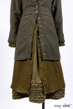 Mathilda Jacket in Central Park Herringbone; Mathilda Coat Dress in Central Park Puckered Weave; Holkham Hall Necktie in Central Park Embroidered Silk; Cape Frock in Central Park Washed Linen.