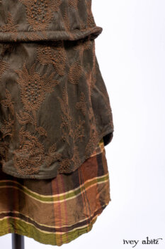 Harrison Duster Coat in Brownstone Crewel Work Weave; Harrison Frock in Cenral Park Brownstone Plaid Silk; Cilla Slip Frock in Signature Black Washed Knit.