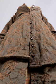 Harrison Duster Coat in Brownstone Crewel Work Weave; Harrison Frock in Cenral Park Brownstone Plaid Silk; Cilla Slip Frock in Signature Black Washed Knit.