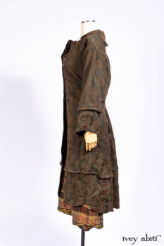 Harrison Duster Coat in Brownstone Crewel Work Weave; Harrison Frock in Cenral Park Brownstone Plaid Silk; Cilla Slip Frock in Signature Black Washed Knit.