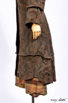Harrison Duster Coat in Brownstone Crewel Work Weave; Harrison Frock in Cenral Park Brownstone Plaid Silk; Cilla Slip Frock in Signature Black Washed Knit.