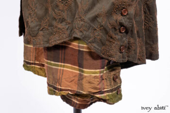 Harrison Duster Coat in Brownstone Crewel Work Weave; Harrison Frock in Cenral Park Brownstone Plaid Silk; Cilla Slip Frock in Signature Black Washed Knit.