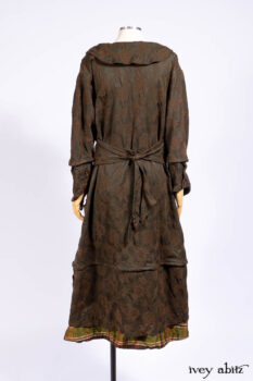 Harrison Duster Coat in Brownstone Crewel Work Weave; Harrison Frock in Cenral Park Brownstone Plaid Silk; Cilla Slip Frock in Signature Black Washed Knit.