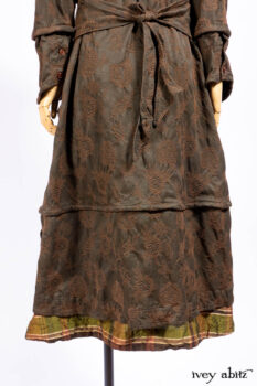 Harrison Duster Coat in Brownstone Crewel Work Weave; Harrison Frock in Cenral Park Brownstone Plaid Silk; Cilla Slip Frock in Signature Black Washed Knit.