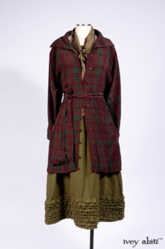 Pierrepont Shirt in Brooklyn Washed Plaid Silk; Limited Edition Clotaire Sash in Central Park Plaid Silk; Cape Frock in Central Park Washed Linen; Cilla Slip Frock in Signature Black Ribbed Knit.