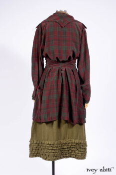 Pierrepont Shirt in Brooklyn Washed Plaid Silk; Limited Edition Clotaire Sash in Central Park Plaid Silk; Cape Frock in Central Park Washed Linen; Cilla Slip Frock in Signature Black Ribbed Knit.