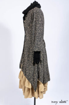 Baudelaire Duster Coat in Mansard Roof and Sandstone Washed Crepe; Delphine Dress in Mansard Roof and Sandstone Sprig Silk Chiffon; Lydia Neck Wrap and Lydia Arm Sleeves in Signature Black Washed Knit; Everett Frock in Sandstone Washed Weave.