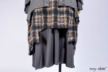 Chittister Shirt Jacket in Slate Ribbed Knit; Chittister Frock in Slate and Brownstone Plaid Wool; Elliot Dress in Slate Washed Knit; Lydia Neck Wrap and Lydia Arm Sleeves in Slate Washed Knit.
