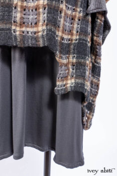 Chittister Shirt Jacket in Slate Ribbed Knit; Chittister Frock in Slate and Brownstone Plaid Wool; Elliot Dress in Slate Washed Knit; Lydia Neck Wrap and Lydia Arm Sleeves in Slate Washed Knit.