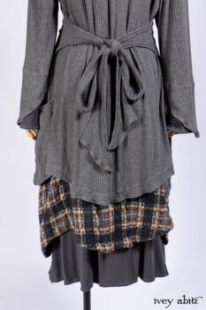 Chittister Shirt Jacket in Slate Ribbed Knit; Chittister Frock in Slate and Brownstone Plaid Wool; Elliot Dress in Slate Washed Knit; Lydia Neck Wrap and Lydia Arm Sleeves in Slate Washed Knit.