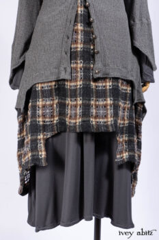 Chittister Shirt Jacket in Slate Ribbed Knit; Chittister Frock in Slate and Brownstone Plaid Wool; Elliot Dress in Slate Washed Knit; Lydia Neck Wrap and Lydia Arm Sleeves in Slate Washed Knit.