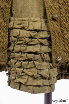 Mathilda Coat Dress in Central Park Puckered Weave; Holkham Hall Necktie in Central Park Embroidered Silk; Cape Frock in Central Park Washed Linen.