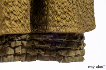 Mathilda Coat Dress in Central Park Puckered Weave; Holkham Hall Necktie in Central Park Embroidered Silk; Cape Frock in Central Park Washed Linen.