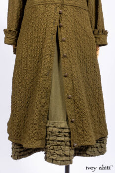 Mathilda Coat Dress in Central Park Puckered Weave; Holkham Hall Necktie in Central Park Embroidered Silk; Cape Frock in Central Park Washed Linen.