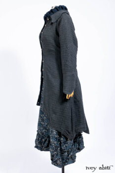 Chittister Duster Coat in Slate Embroidered Windowpane Weave; Gabled Shirt Jacket in Hudson River Silky Crinkled Weave; Gabled Frock in Hudson River Floral Jacquard; Cilla Slip Frock in Slate Washed Knit.