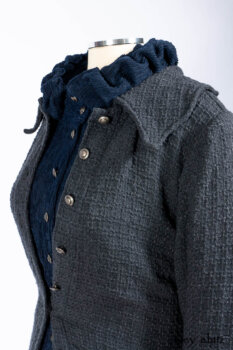 Chittister Duster Coat in Slate Embroidered Windowpane Weave; Gabled Shirt Jacket in Hudson River Silky Crinkled Weave; Gabled Frock in Hudson River Floral Jacquard; Cilla Slip Frock in Slate Washed Knit.