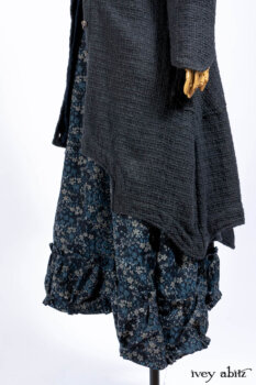 Chittister Duster Coat in Slate Embroidered Windowpane Weave; Gabled Shirt Jacket in Hudson River Silky Crinkled Weave; Gabled Frock in Hudson River Floral Jacquard; Cilla Slip Frock in Slate Washed Knit.