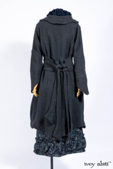 Chittister Duster Coat in Slate Embroidered Windowpane Weave; Gabled Shirt Jacket in Hudson River Silky Crinkled Weave; Gabled Frock in Hudson River Floral Jacquard; Cilla Slip Frock in Slate Washed Knit.
