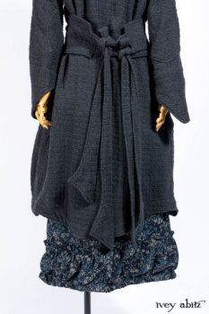 Chittister Duster Coat in Slate Embroidered Windowpane Weave; Gabled Shirt Jacket in Hudson River Silky Crinkled Weave; Gabled Frock in Hudson River Floral Jacquard; Cilla Slip Frock in Slate Washed Knit.