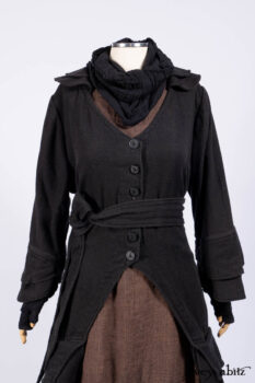 Everett Duster Coat in Mansard Roof Coat Weave; Lydia Neck Wrap and Lydia Arm Wraps in Signature Black Washed Knit; Roebling Frock in Brownstone Washed Linen; Cilla Slip Frock in Signature Black Washed Knit.