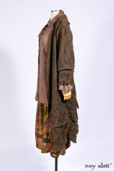 Harrison Duster Coat in Brownstone Crewel Work Weave; Ellis Shirt in Rooftop Sunset Washed Voile; Harrison Frock in Central Park Brownstone Plaid Silk; Cilla Slip Frock in Signature Black Ribbed Knit.