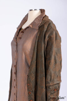 Harrison Duster Coat in Brownstone Crewel Work Weave; Ellis Shirt in Rooftop Sunset Washed Voile; Harrison Frock in Central Park Brownstone Plaid Silk; Cilla Slip Frock in Signature Black Ribbed Knit.