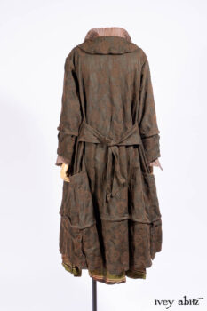 Harrison Duster Coat in Brownstone Crewel Work Weave; Ellis Shirt in Rooftop Sunset Washed Voile; Harrison Frock in Central Park Brownstone Plaid Silk; Cilla Slip Frock in Signature Black Ribbed Knit.
