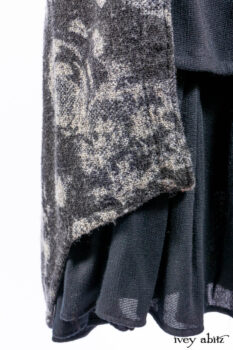 Monceau Duster Coat in Mansard Roof Washed Floral Woolen Weave; Lydia Neck Wrap in Slate Washed Linen; Blanchefleur Dress in Mansard Roof Washed Weave; Cilla Slip Frock in Signature Black Ribbed Knit; Porte Cochere Sash in Mansard Roof Washed Floral Woolen Weave.