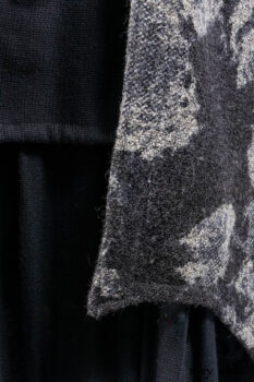 Monceau Duster Coat in Mansard Roof Washed Floral Woolen Weave; Lydia Neck Wrap in Slate Washed Linen; Blanchefleur Dress in Mansard Roof Washed Weave; Cilla Slip Frock in Signature Black Ribbed Knit; Porte Cochere Sash in Mansard Roof Washed Floral Woolen Weave.