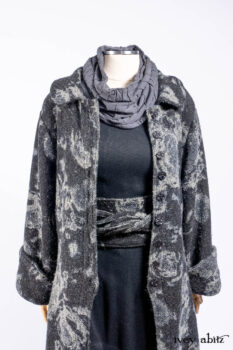 Monceau Duster Coat in Mansard Roof Washed Floral Woolen Weave; Lydia Neck Wrap in Slate Washed Linen; Blanchefleur Dress in Mansard Roof Washed Weave; Cilla Slip Frock in Signature Black Ribbed Knit; Porte Cochere Sash in Mansard Roof Washed Floral Woolen Weave.