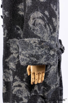 Monceau Duster Coat in Mansard Roof Washed Floral Woolen Weave; Lydia Neck Wrap in Slate Washed Linen; Blanchefleur Dress in Mansard Roof Washed Weave; Cilla Slip Frock in Signature Black Ribbed Knit; Porte Cochere Sash in Mansard Roof Washed Floral Woolen Weave.
