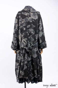 Monceau Duster Coat in Mansard Roof Washed Floral Woolen Weave; Lydia Neck Wrap in Slate Washed Linen; Blanchefleur Dress in Mansard Roof Washed Weave; Cilla Slip Frock in Signature Black Ribbed Knit; Porte Cochere Sash in Mansard Roof Washed Floral Woolen Weave.